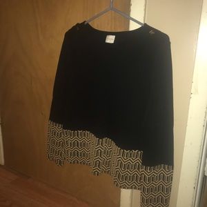 Black shirt with gold trim.